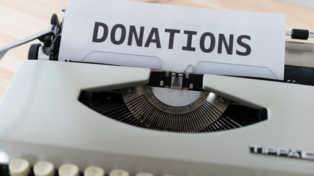 Typewriter with a sheet of paper showing the word “donations,” representing donor cultivation strategies to increase giving.