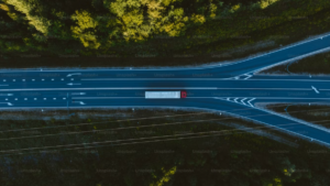 Overhead view of a highway splitting into three separate roads